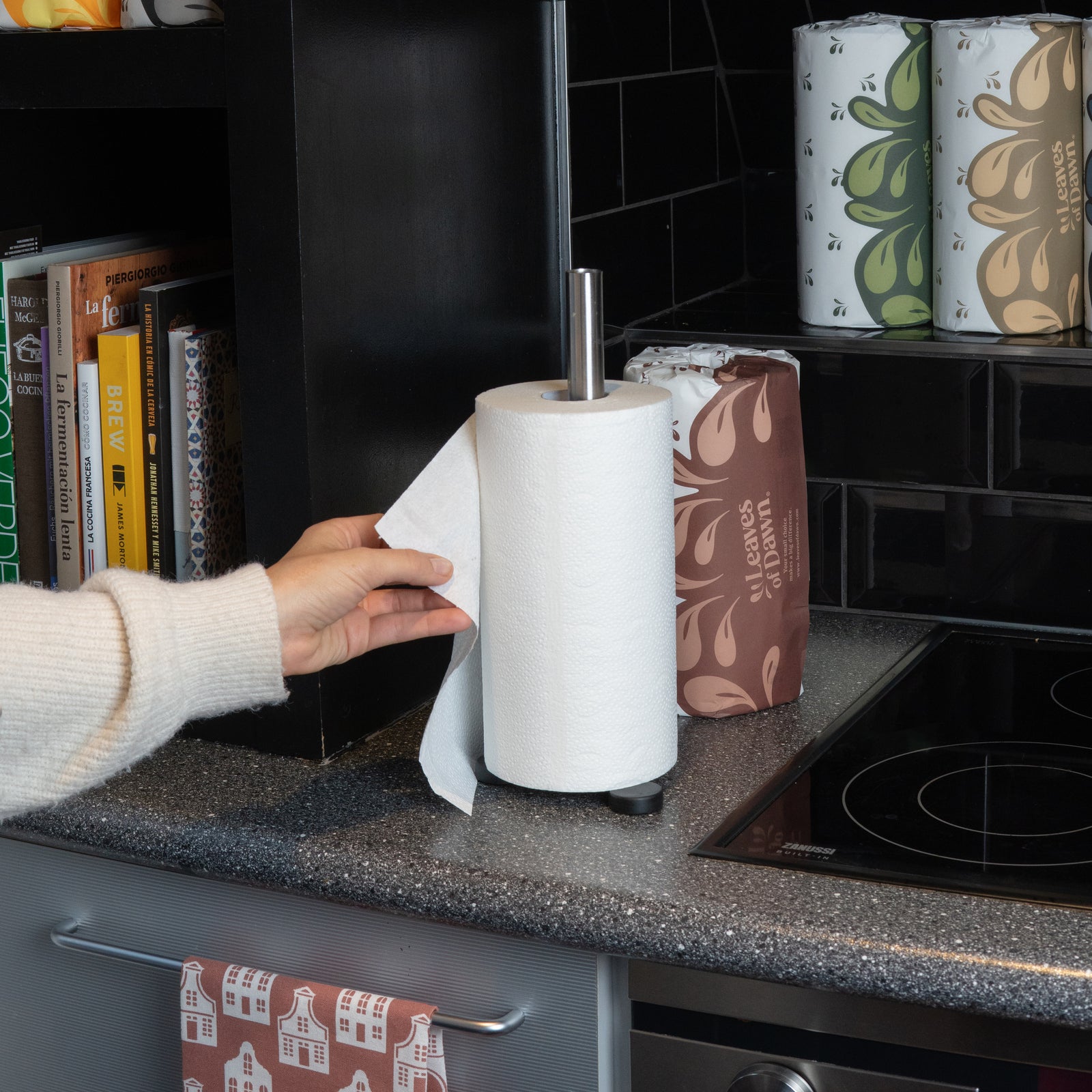 A 12-pack of Leaves of Dawn bamboo paper towels, an eco-friendly and ultra-absorbent solution for a clean home.